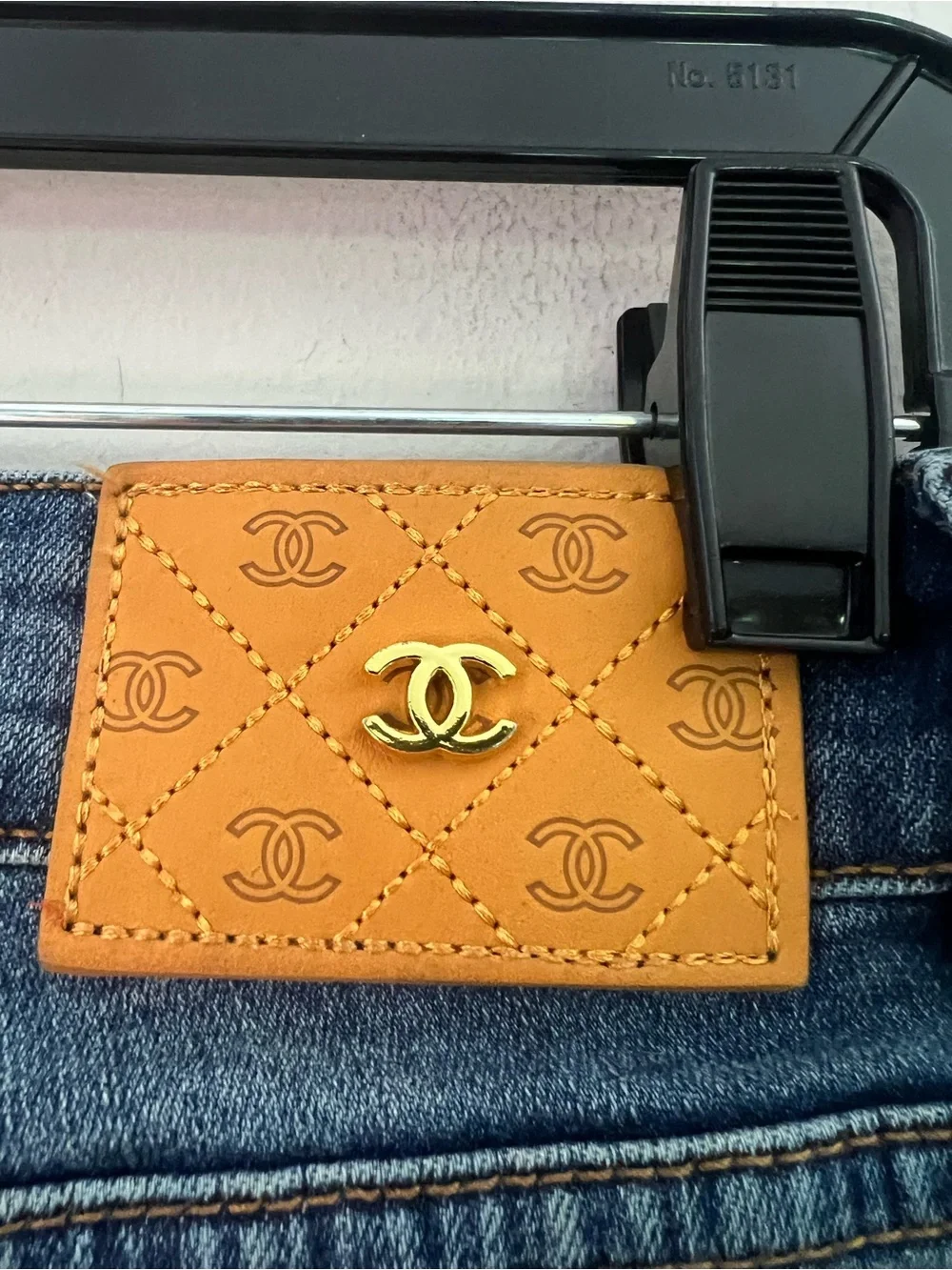 CHANEL Women's Blue Skinny Jeans with Gold-Tone Studs
